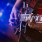Man,Playing,Guitar,On,A,Stage,Musical,Concert,Close-up,View.guitarist